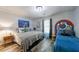 Fun bedroom with colorful artwork and unique decor, including a burger-shaped ottoman at 1915 Cooper Landing Se Dr, Smyrna, GA 30080