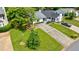 Charming single-story home with a well-manicured lawn, long driveway, and mature shade trees at 1915 Cooper Landing Se Dr, Smyrna, GA 30080