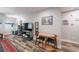 Inviting living area with wood-look flooring, neutral walls, and decorative art at 1915 Cooper Landing Se Dr, Smyrna, GA 30080