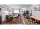Open living area showcasing eclectic furnishings, art and décor with hardwood floors and natural light at 1915 Cooper Landing Se Dr, Smyrna, GA 30080