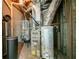 Modern furnace and mechanical equipment in the basement utility area at 4495 Riders Ridge Trl, Snellville, GA 30039