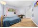 Comfortable bedroom with wood floors, study desk and lots of natural light through the window at 472 Sherman Way, Decatur, GA 30033
