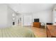 Bedroom showcasing spacious closet, view to bathroom, and ample natural light at 472 Sherman Way, Decatur, GA 30033