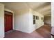 Hallway of the unit with a red front door and textured walls at 472 Sherman Way, Decatur, GA 30033
