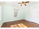 Light-filled bedroom featuring hardwood floors and a window offering ample natural light at 70 Mount Paran Ne Rd, Atlanta, GA 30342