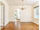 Dining room features hardwood floors, chandelier lighting, and access to the kitchen at 70 Mount Paran Ne Rd, Atlanta, GA 30342