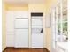 Convenient laundry area with stacked washer/dryer unit and additional storage at 70 Mount Paran Ne Rd, Atlanta, GA 30342