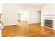 Inviting living room boasts gleaming hardwood floors and classic fireplace detail at 70 Mount Paran Ne Rd, Atlanta, GA 30342