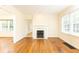 Spacious living room features hardwood floors, large windows, and a decorative fireplace at 70 Mount Paran Ne Rd, Atlanta, GA 30342