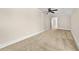 Bedroom featuring neutral walls and carpet, complemented by modern fixtures at 90 Alcovy Reserve Way, Covington, GA 30014