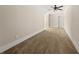 Bedroom featuring neutral walls and carpet, illuminated by a ceiling fan at 90 Alcovy Reserve Way, Covington, GA 30014