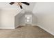 Large bonus room with neutral walls and carpet, ideal for flexible living and entertainment at 90 Alcovy Reserve Way, Covington, GA 30014