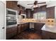 Stylish kitchen featuring stainless appliances, tile backsplash, and ample cabinetry at 90 Alcovy Reserve Way, Covington, GA 30014