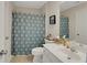 Clean bathroom with a tub-shower combination and a white vanity at 125 Rabbits Run, Fayetteville, GA 30215