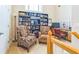 Comfortable home office featuring built-in shelving and an inviting reading nook at 125 Rabbits Run, Fayetteville, GA 30215