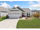 Charming home with a well-manicured lawn, two-car garage, and inviting front entrance at 41 Balsam Dr, Dallas, GA 30157
