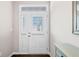 Bright foyer with a white front door and a view of the house at 41 Balsam Dr, Dallas, GA 30157