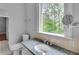 Bathroom showcasing granite counters, a window with a view, and tile flooring at 470 Manor Oak Se Ln, Marietta, GA 30067