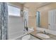 Bathroom showcasing a shower/tub combo, granite counters, and a large mirror at 470 Manor Oak Se Ln, Marietta, GA 30067