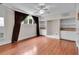 Bedroom with hardwood floors, ceiling fan, and built in shelving with cabinets at 470 Manor Oak Se Ln, Marietta, GA 30067