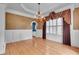 Elegant dining room showcasing hardwood floors and ample natural light at 470 Manor Oak Se Ln, Marietta, GA 30067