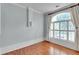 Bright room with hardwood floors, large windows, and white trim at 470 Manor Oak Se Ln, Marietta, GA 30067