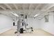 Finished basement featuring neutral color palette and includes a multi-station gym at 635 Wilson Nw Rd, Atlanta, GA 30318