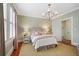Bright bedroom with large window, bedside tables and lamps, and comfortable bed at 635 Wilson Nw Rd, Atlanta, GA 30318