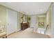 Bright hallway with neutral walls, recessed lighting, and a table with decorative lamps at 635 Wilson Nw Rd, Atlanta, GA 30318