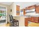 Open kitchen with granite countertops, stainless steel appliances, and bar seating area at 635 Wilson Nw Rd, Atlanta, GA 30318