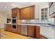 Well-appointed kitchen with granite countertops and modern stainless steel appliances at 635 Wilson Nw Rd, Atlanta, GA 30318