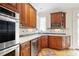 Gourmet kitchen with stainless steel appliances, including a double oven and dishwasher at 635 Wilson Nw Rd, Atlanta, GA 30318