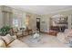 Cozy living room with archway, plush seating, and lots of natural light at 635 Wilson Nw Rd, Atlanta, GA 30318