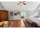 The primary bedroom offers ample space with wooden floors, natural light, and stylish furnishings at 635 Wilson Nw Rd, Atlanta, GA 30318
