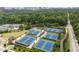 Aerial view showing multiple tennis courts and surrounding greenery, perfect for outdoor enjoyment at 635 Wilson Nw Rd, Atlanta, GA 30318