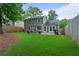 Spacious back yard with grass and patio, great for entertaining at 1217 Club Walk Ne Dr, Brookhaven, GA 30319