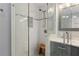 Modern bathroom featuring a glass-enclosed shower and marble accents at 1217 Club Walk Ne Dr, Brookhaven, GA 30319