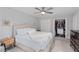 Spacious bedroom with a ceiling fan, closet, and a view at 1217 Club Walk Ne Dr, Brookhaven, GA 30319