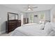 Inviting bedroom with a dresser and doors leading to the backyard at 1217 Club Walk Ne Dr, Brookhaven, GA 30319