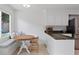 Bright breakfast nook with a built-in bench seat and a view of the backyard at 1217 Club Walk Ne Dr, Brookhaven, GA 30319