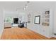 Open-concept living room with built-in shelving, hardwood floors, and a fireplace, ideal for entertaining at 1217 Club Walk Ne Dr, Brookhaven, GA 30319