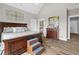 Bedroom featuring wood floors, natural light, and decoratively appointed furnishings at 1423 Hillcrest Rd, Bowdon, GA 30108