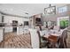Spacious open concept layout connecting the kitchen, dining area, and living room at 1423 Hillcrest Rd, Bowdon, GA 30108