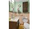 Bathroom with tiled wall, a sink with vanity, and a toilet at 2237 Walt Stephens Rd, Jonesboro, GA 30236