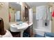 Bathroom features a vanity sink and bathtub with shower at 2237 Walt Stephens Rd, Jonesboro, GA 30236