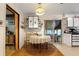 Bright dining area with a table and chairs, with a view to the kitchen area at 2237 Walt Stephens Rd, Jonesboro, GA 30236