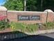 Forest Estates on Lake Spivey entrance sign with brick wall and lush greenery at 2237 Walt Stephens Rd, Jonesboro, GA 30236