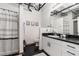 Modern bathroom featuring a vanity with drawers, shower with a curtain, and sleek fixtures at 878 Peachtree Ne St # 634, Atlanta, GA 30309