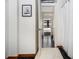 Bright bathroom with modern fixtures, a neutral palette, and an open doorway to the primary bedroom at 878 Peachtree Ne St # 634, Atlanta, GA 30309