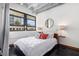 Cozy bedroom with large windows, natural light, and a comfortable bed with stylish bedding at 878 Peachtree Ne St # 634, Atlanta, GA 30309